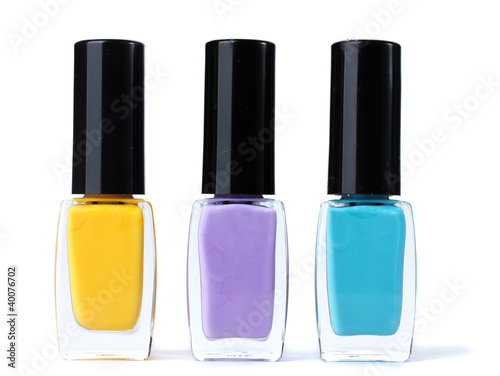 Group of bright nail polishes isolated on white