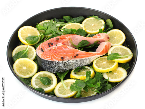 Red fish with lemon, parsley and pepper