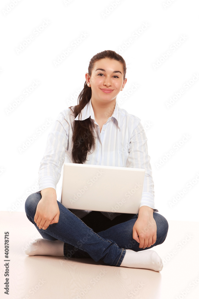A college girl sitting on the floor A college girl sitting on the floor