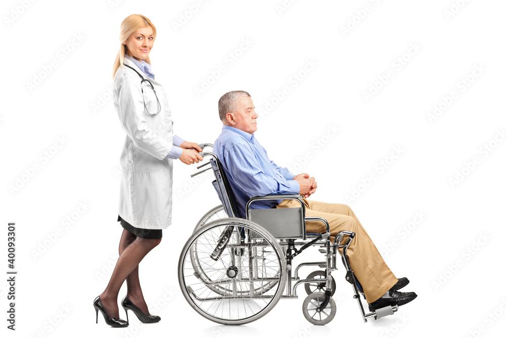 Nurse or doctor pushing a handicapped senior man in a wheelchair Nurse or doctor pushing a handicapped senior man in a wheelchair