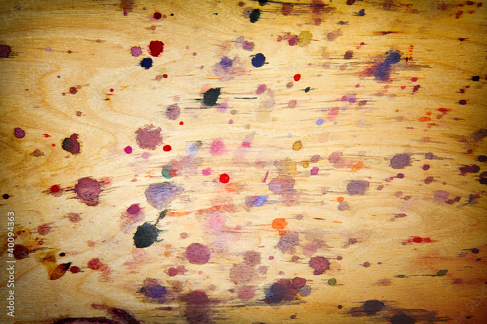 wooden surface with drops of paint