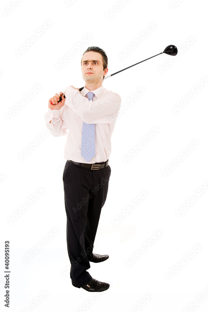 Young business man swinging a golf club isolated over a white ba Young business man swinging a golf club isolated over a white ba