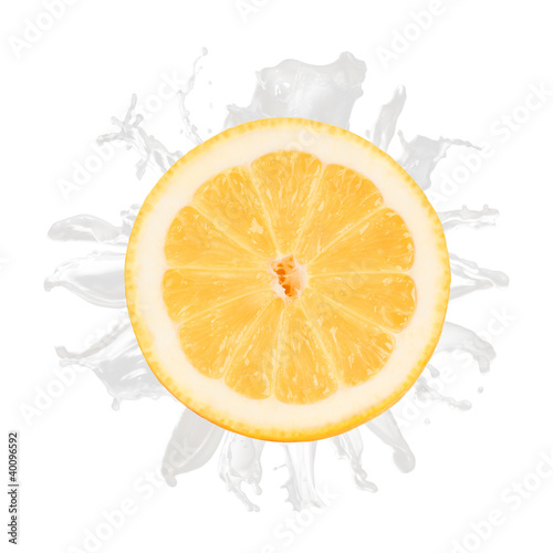 sliced lemon splash with milk isolated on white background