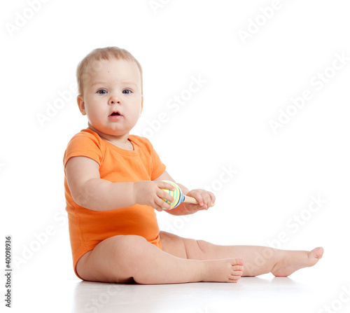 baby playing with musical toy