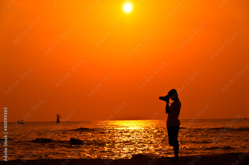 Photographer with sillouette on Hua Hin Beach