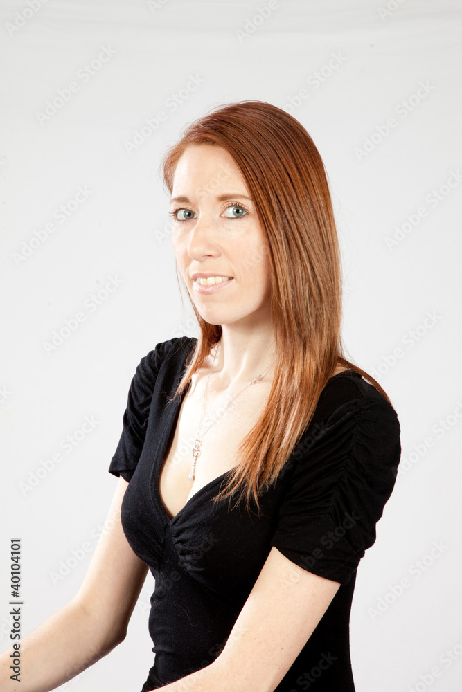 woman with long hair smiling at the camera woman with long hair smiling at the camera