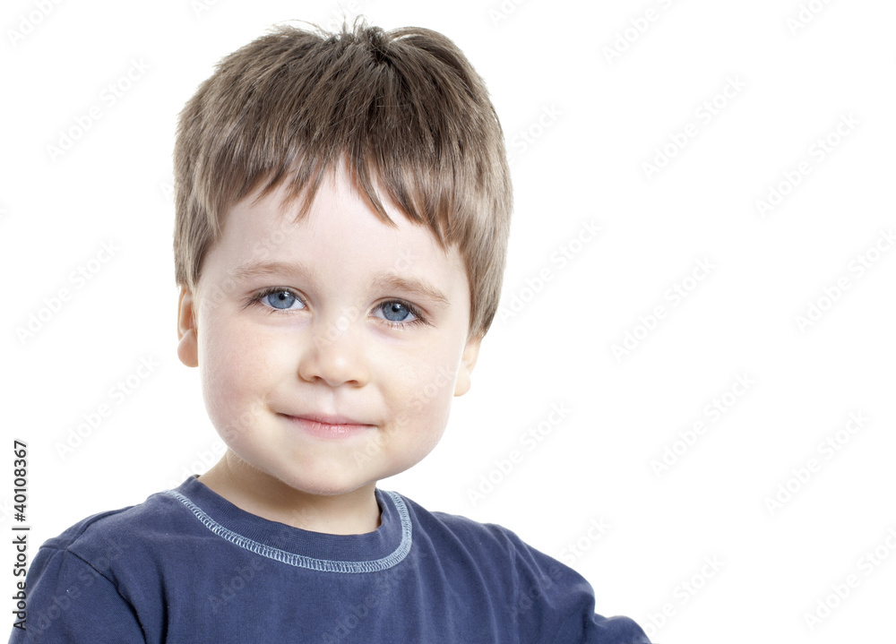 Beautiful young boy looking to camera Beautiful young boy looking to camera