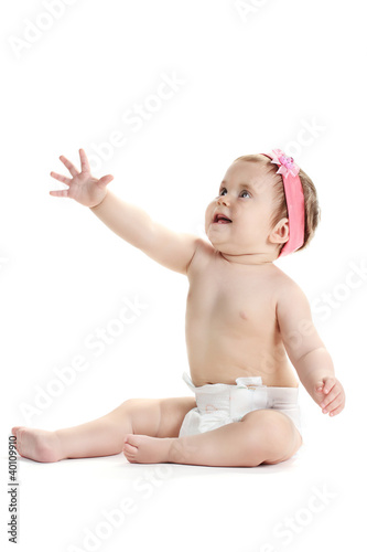 Cute baby girl sitting and ...