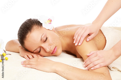 An attractive woman getting spa treatment, side-view