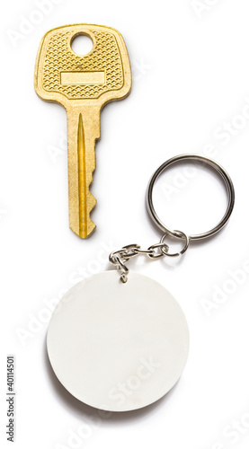 Badge and key on the white background