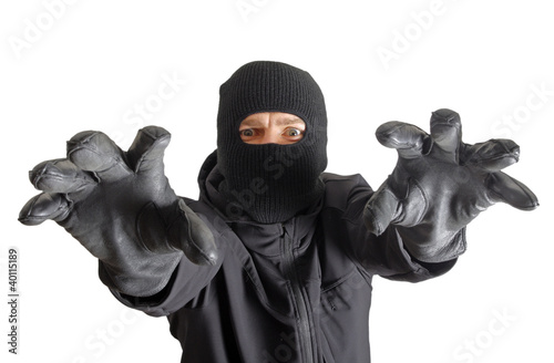 Masked criminal, isolated on white