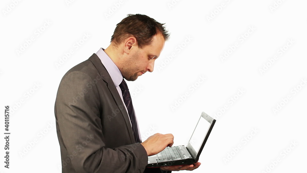 Young businessman with laptop, isolated on white Young businessman with laptop, isolated on white
