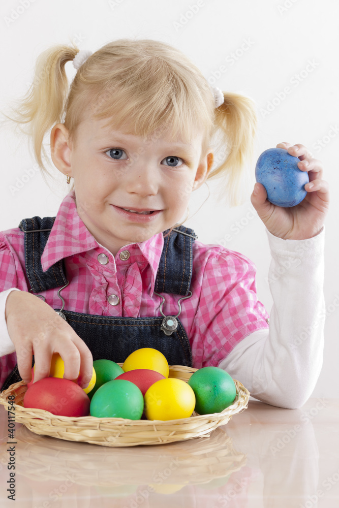 Fototapeta premium portrait of little girl with Easter eggs