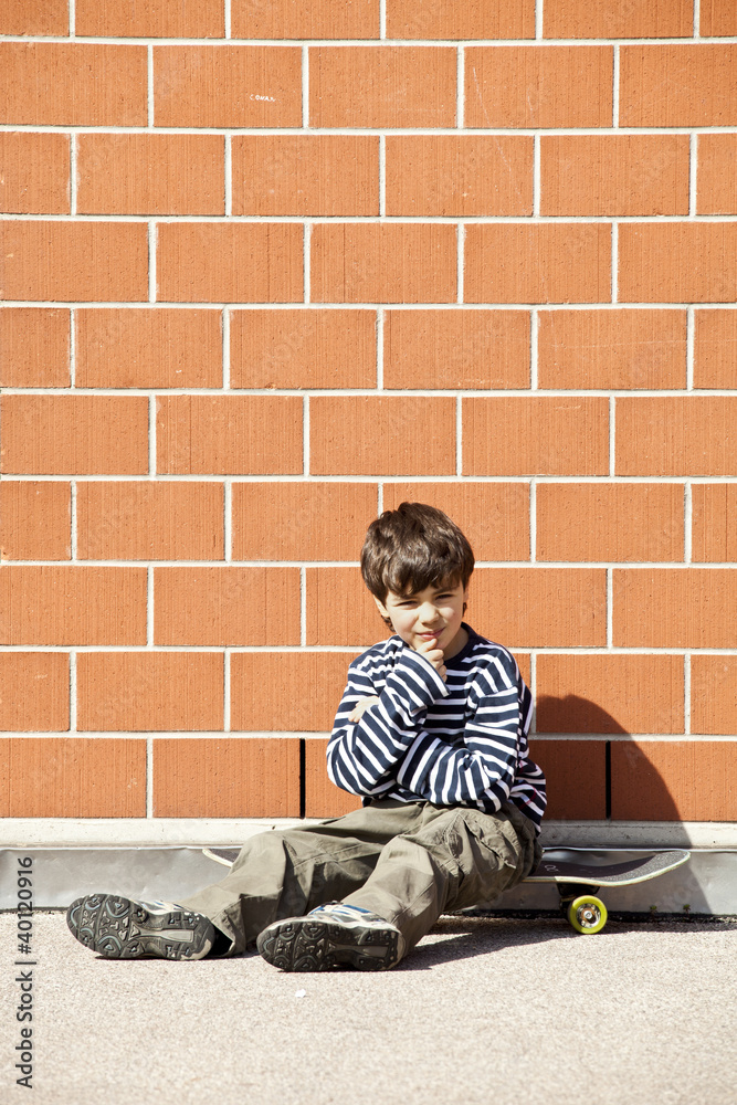 child and skateboard child and skateboard