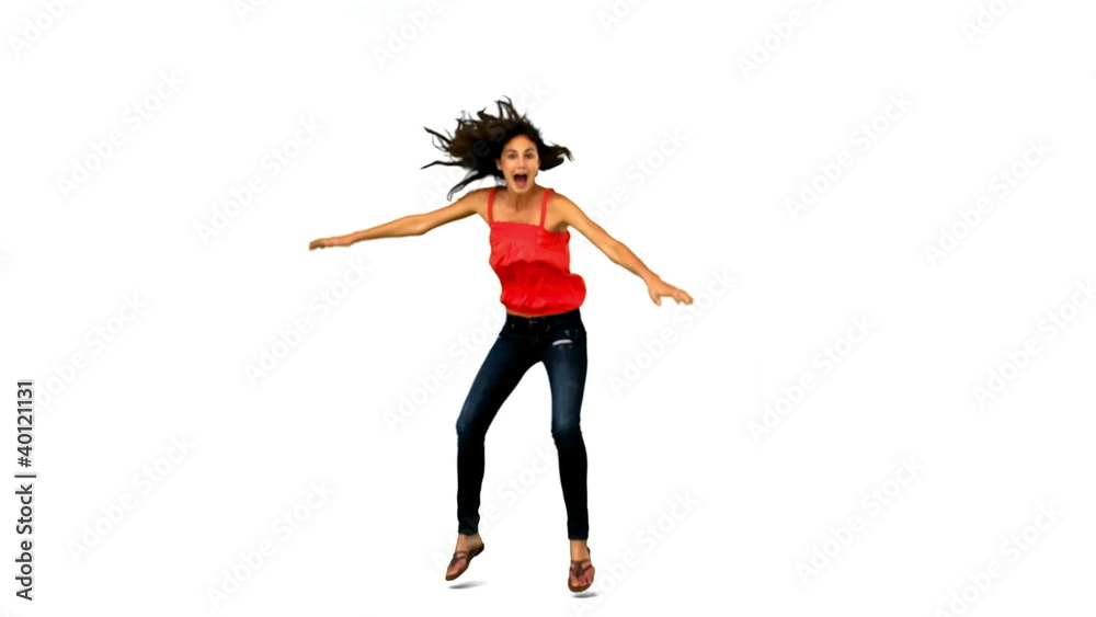 Woman jumping and turning in slow motion Woman jumping and turning in slow motion