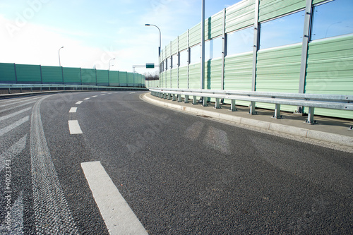 Noise barrier wall on a highway photo