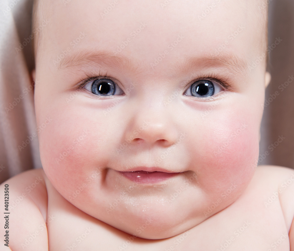 Close-up portrait of sweet little smiling baby girl Close-up portrait of sweet little smiling baby girl