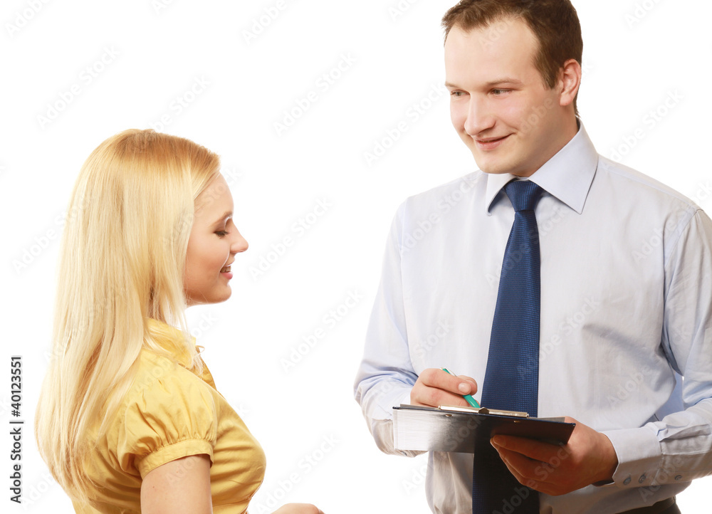 A man filling a questionnaire with a woman, isolated on white