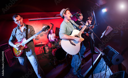 Photography musician plays a guitar