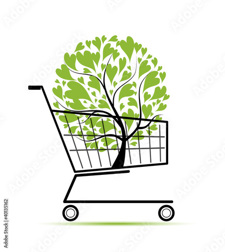 Green tree in shopping cart for your design