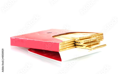single chewing gum wrapped in standard red packaging isolated