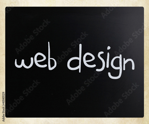 "Web design" handwritten with white chalk on a blackboard