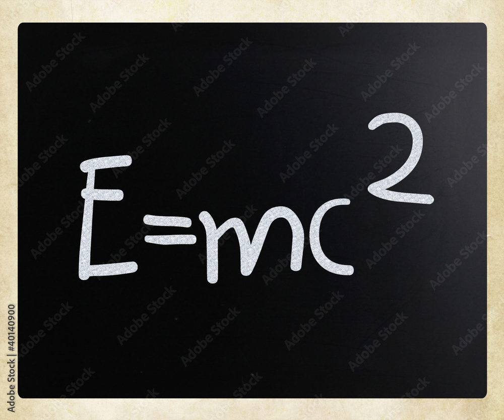 E=mc2 handwritten with white chalk on a blackboard StockIllustration