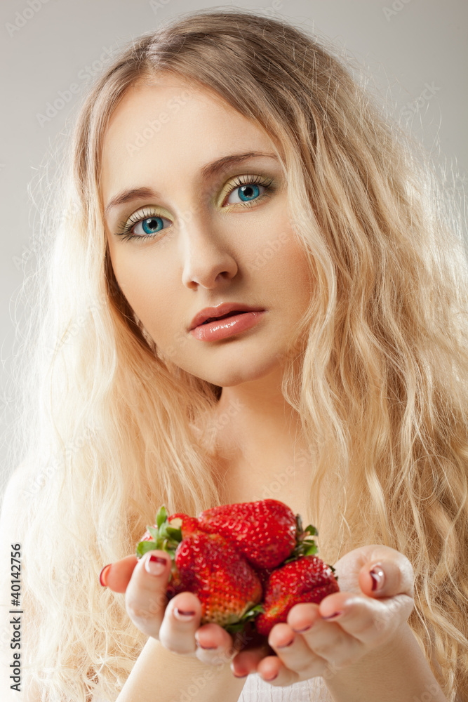 closeup portrait of woman who holding strawberry closeup portrait of woman who holding strawberry