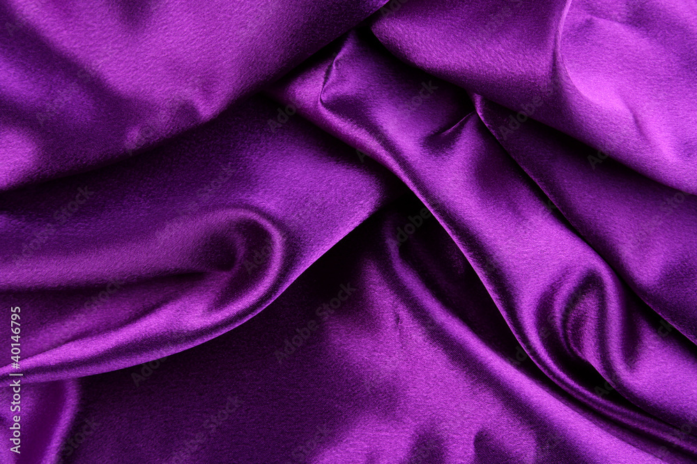 Fototapeta premium Purple silk fabric texture background