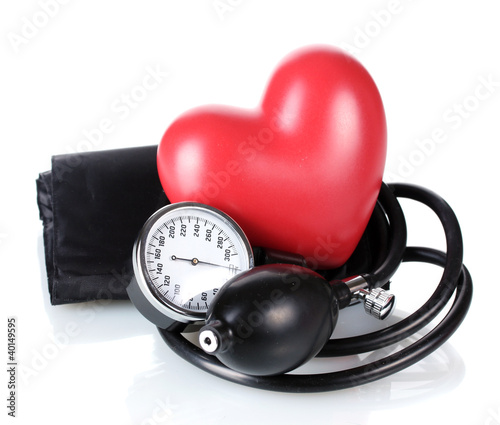 Black tonometer and heart isolated on white photo