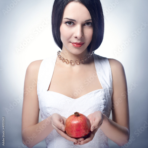 woman with pomegranates