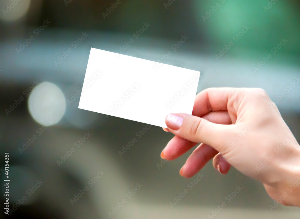 white card in a hand white card in a hand
