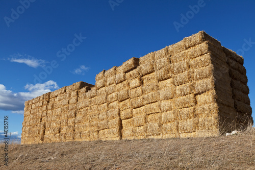 Large pile of hay bales