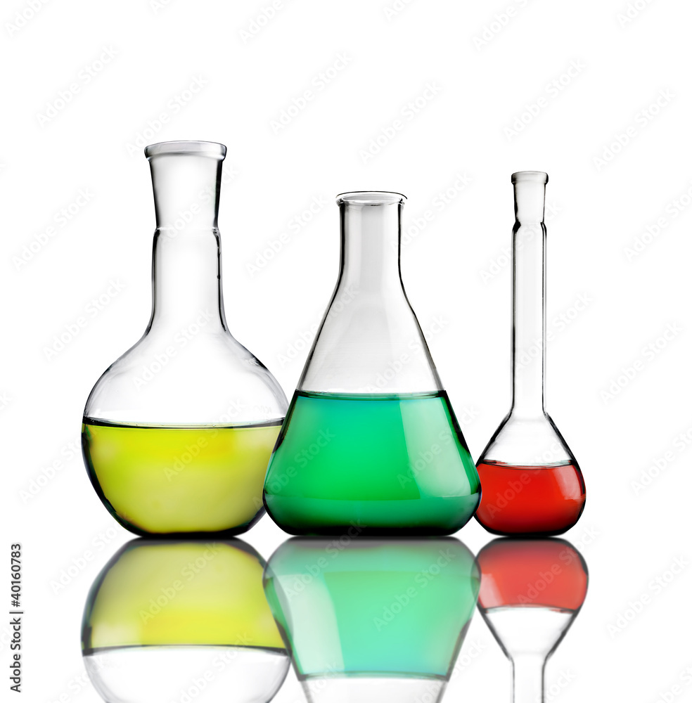 Science lab bottles with colored liquids inside Science lab bottles with colored liquids inside