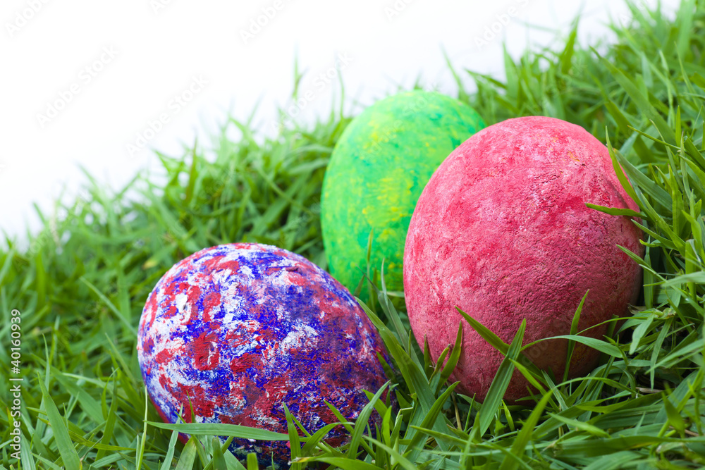 colorful painted three easter eggs on the grass colorful painted three easter eggs on the grass