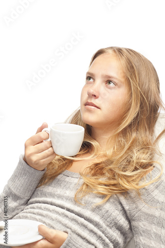 young blond girl with white cup