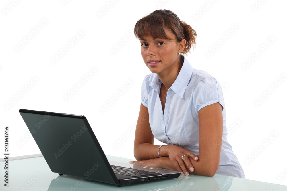 Woman sitting in front of laptop Woman sitting in front of laptop