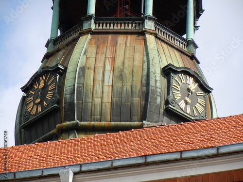 Картината върху платно Red roof and church tower (Riga, Latvia)