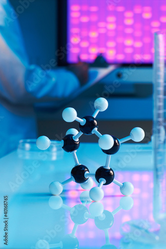 close up of molecular model with dna sample