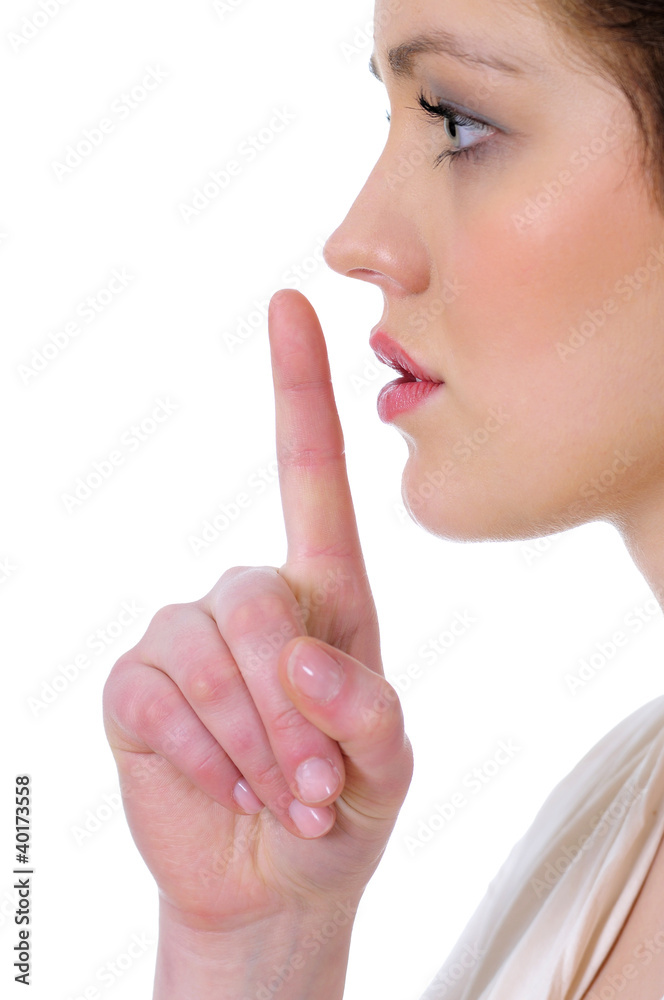 Bright picture of young woman with finger on lips Bright picture of young woman with finger on lips