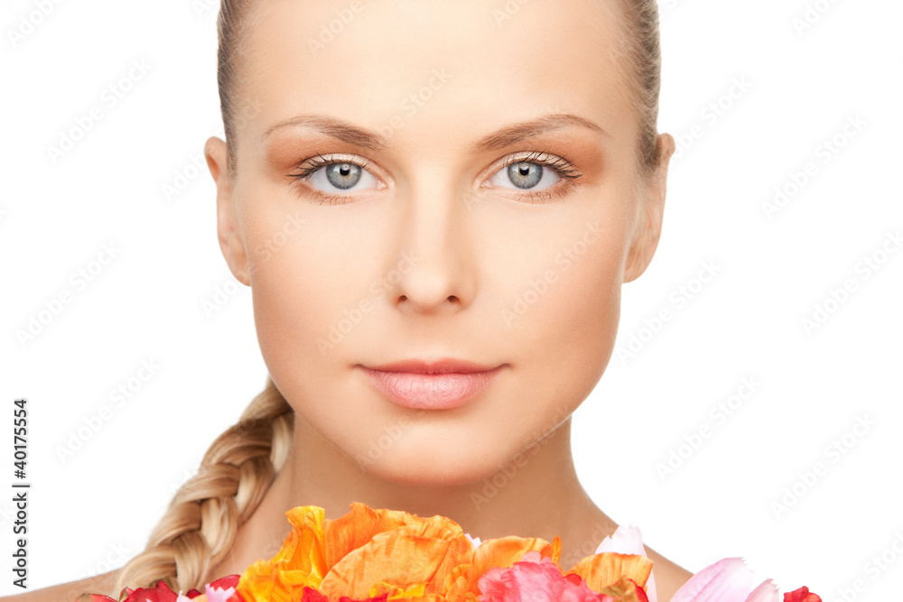 Fototapeta premium lovely woman with red flowers