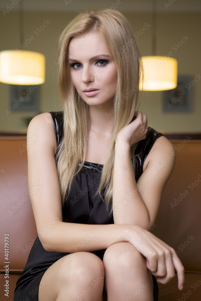 blond woman in black dress blond woman in black dress
