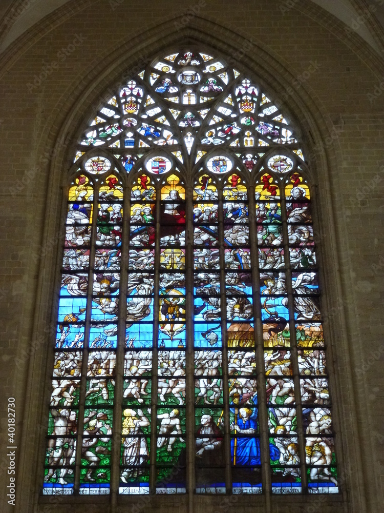 The colorful stained glass of the windows in the cathedral