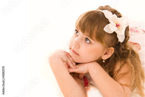 Portrait of a beautiful girl lying dreming photo