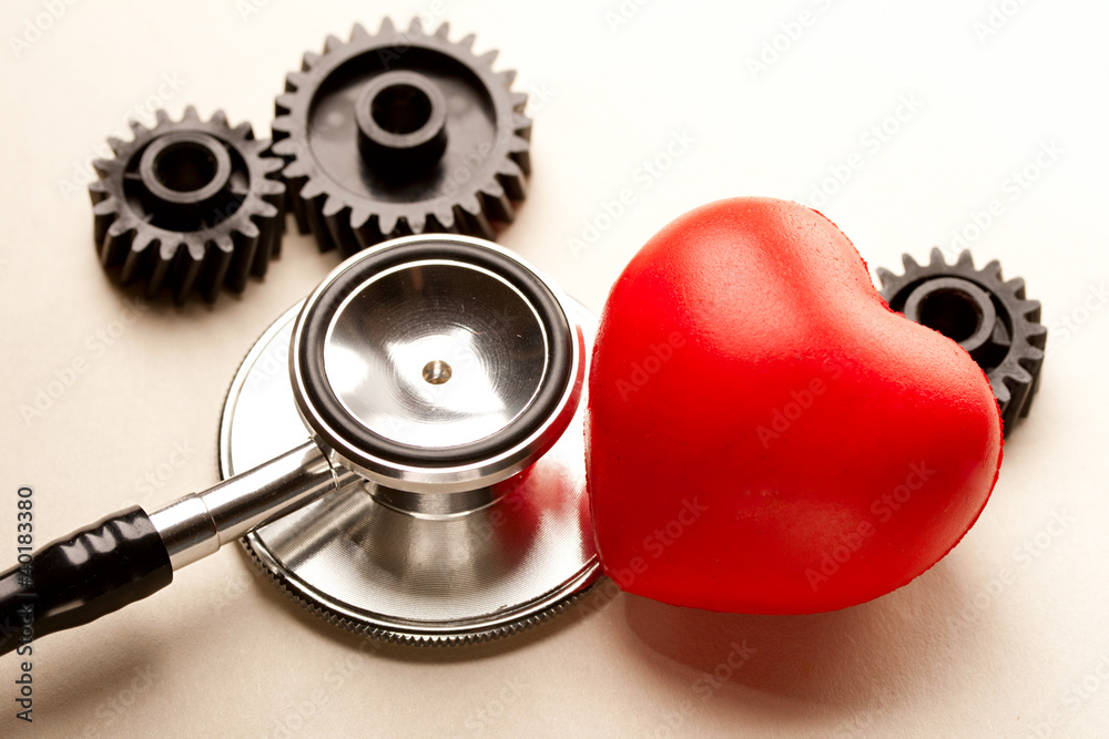 Mechanical ratchets, stethoscope and red heart Mechanical ratchets, stethoscope and red heart