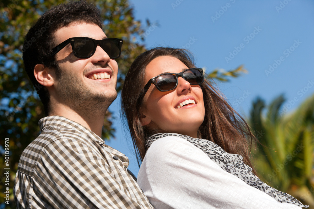 Close up portrait of couple with sunglasses Close up portrait of couple with sunglasses