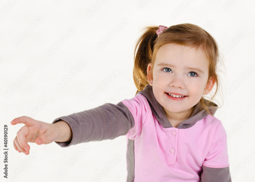 Portrait of smiling little girl showing something Portrait of smiling little girl showing something