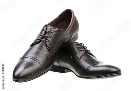 Pair of elegant male shoes over white background