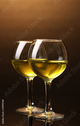 Wineglass on brown background © Africa Studio