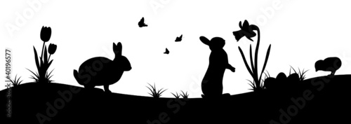 Easter scene with bunnies, chick, and flowers